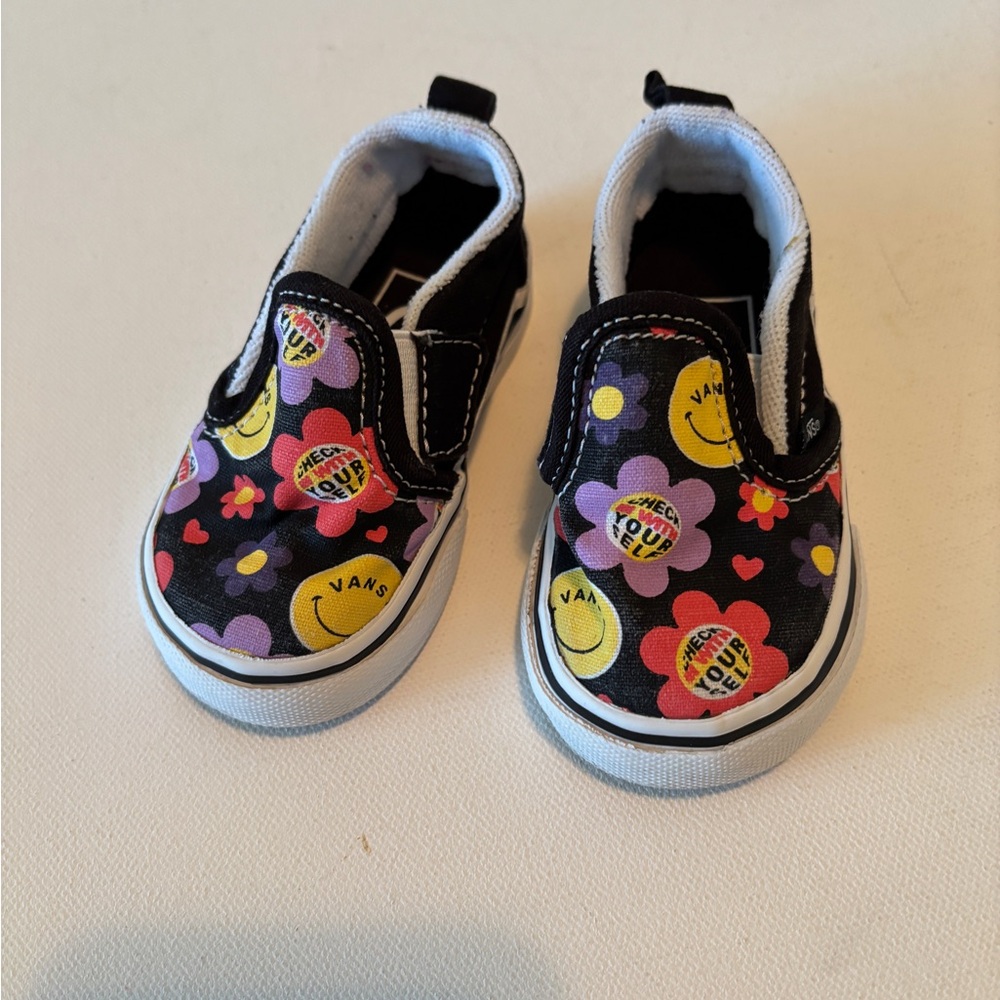 Vans Infant Black and Colorful Floral Slip-On Sneakers